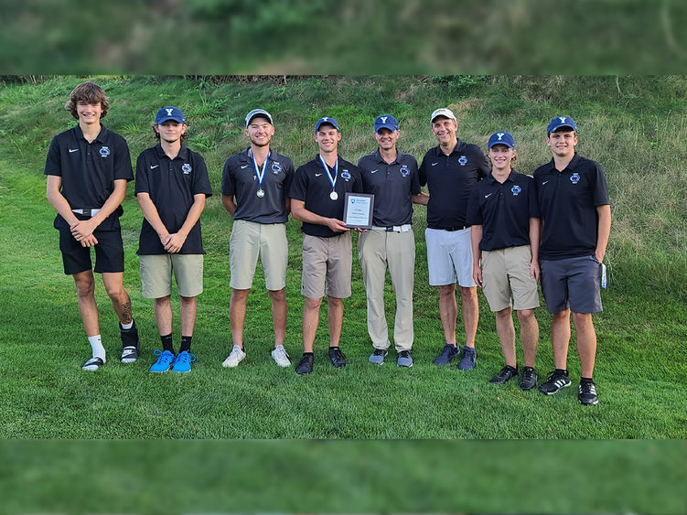 Golf team and coaches (eight males) show off the first-place trophy Penn State York won