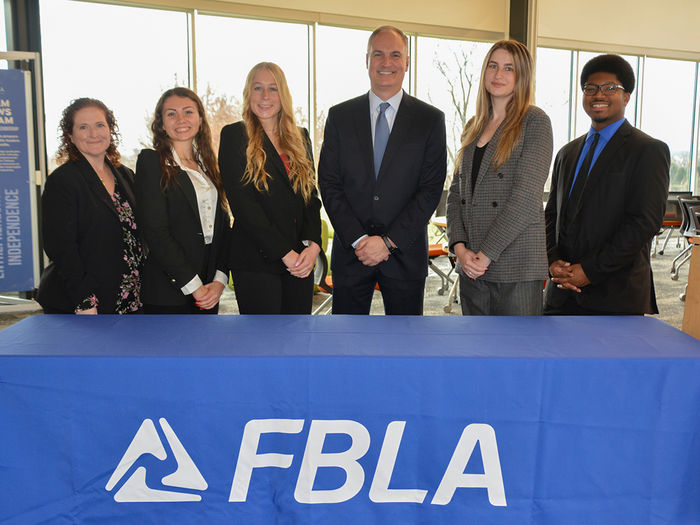 Students in FBLA at a guest speaker event.