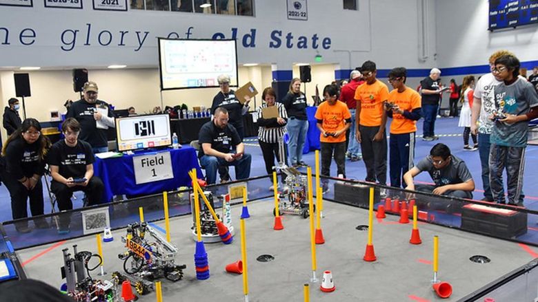 Students competing in a robotics competition
