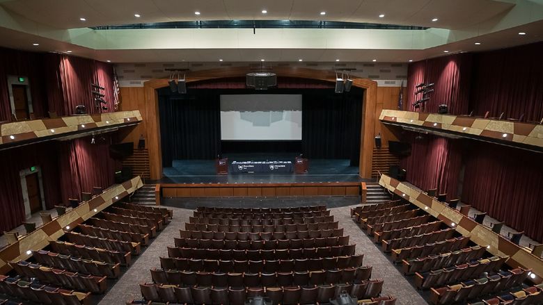 Inside of a theater, looking at stage.