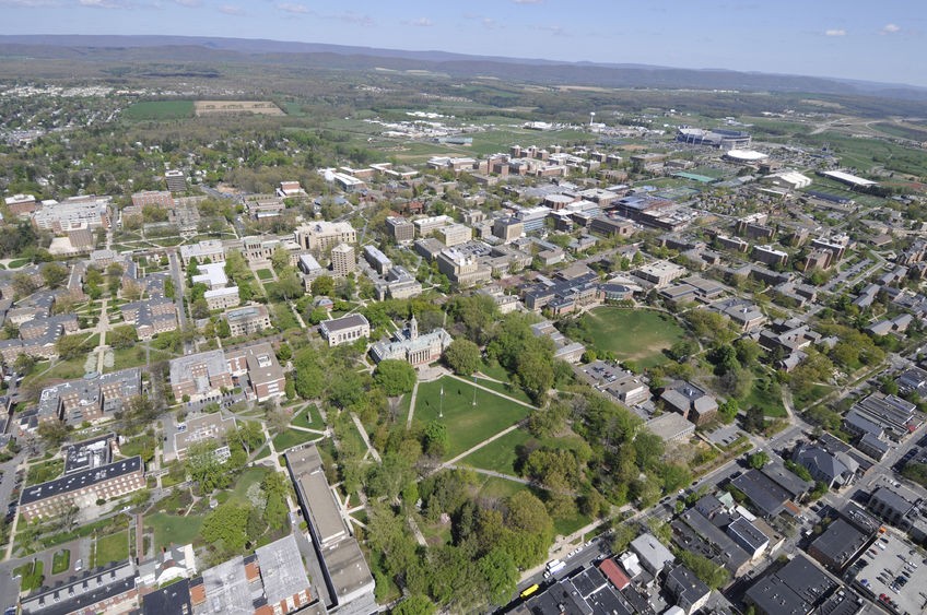 An aerial view over Penn State's University Park campus and State College